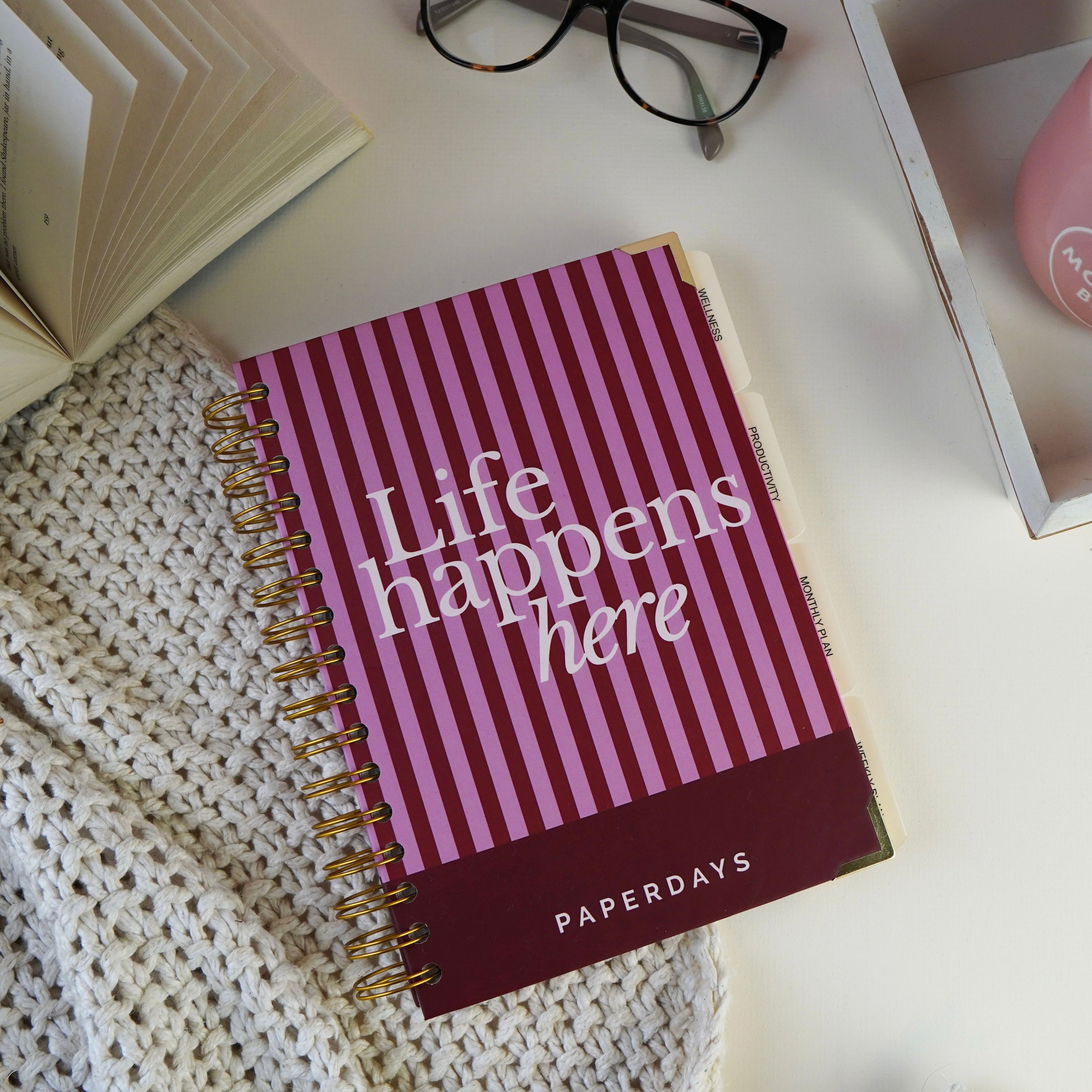 Bicycle with a white basket containing a PaperDays Planner